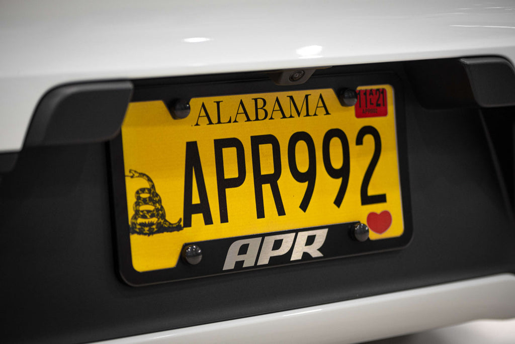 APR LICENSE PLATE FRAME - THICK, BLACK W/ HIDERS