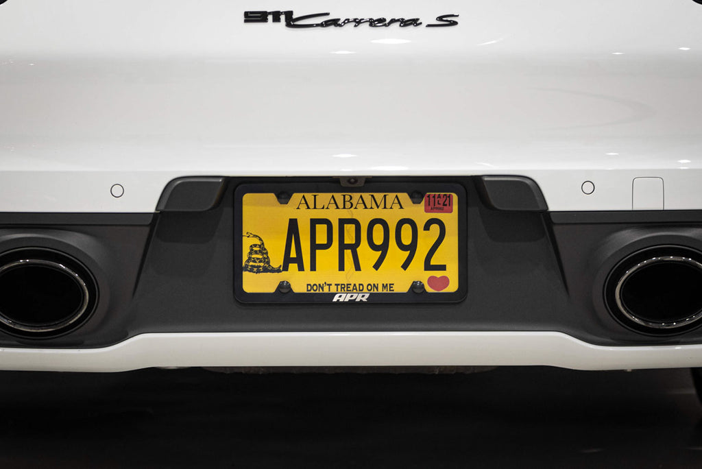 APR LICENSE PLATE FRAME - SLIM, BLACK W/ HIDERS